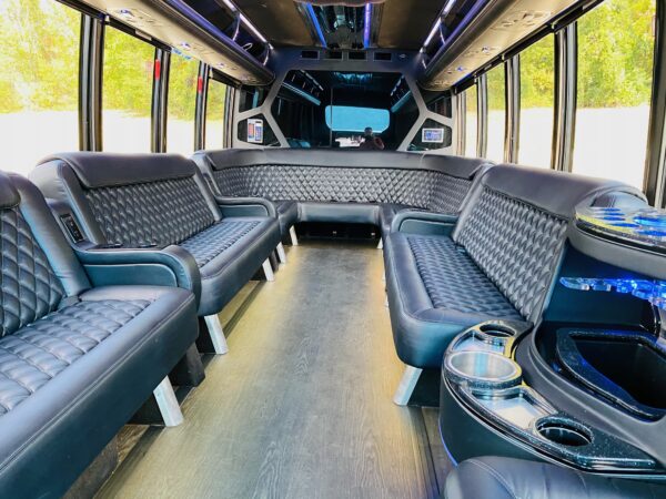 23 passenger luxury minibus with surround seats.